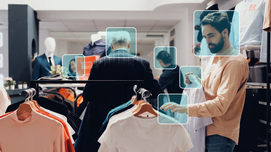 Shoppers in a clothing store being identified by AI.
