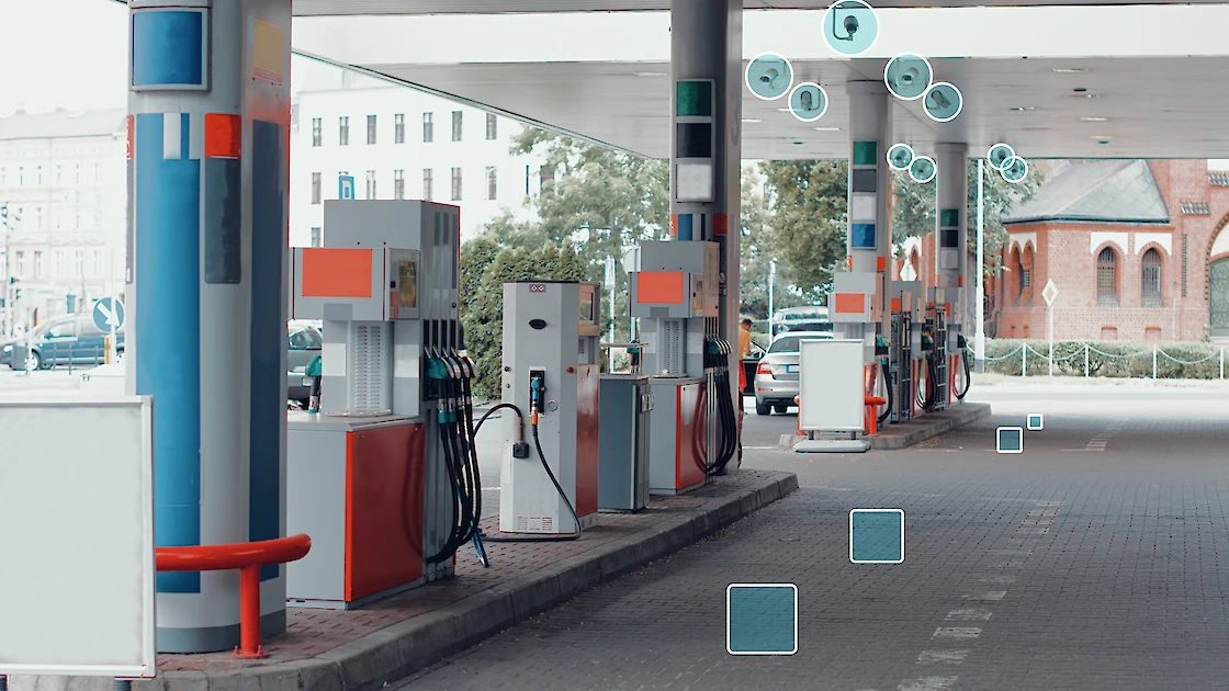 A gas station utilizing cameras connected to AI to monitor usage.