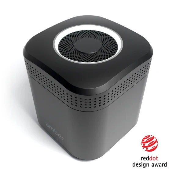 An AmberPRO device with Red Dot Design Award badge
