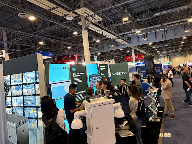 A group of people at a convention  AI-generated content may be incorrect.